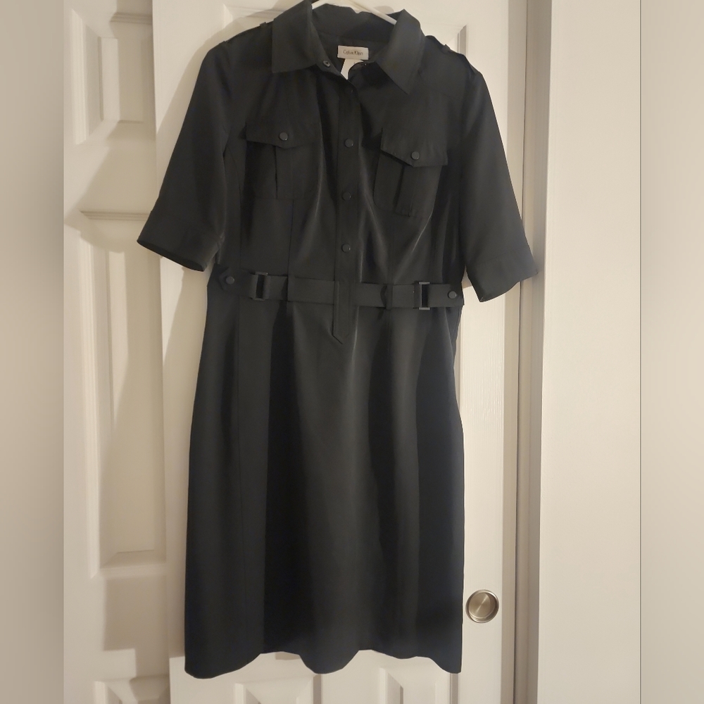 Calvin Klein women black dress with a side zipper.